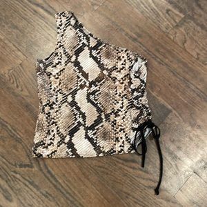 One shoulder cropped too.